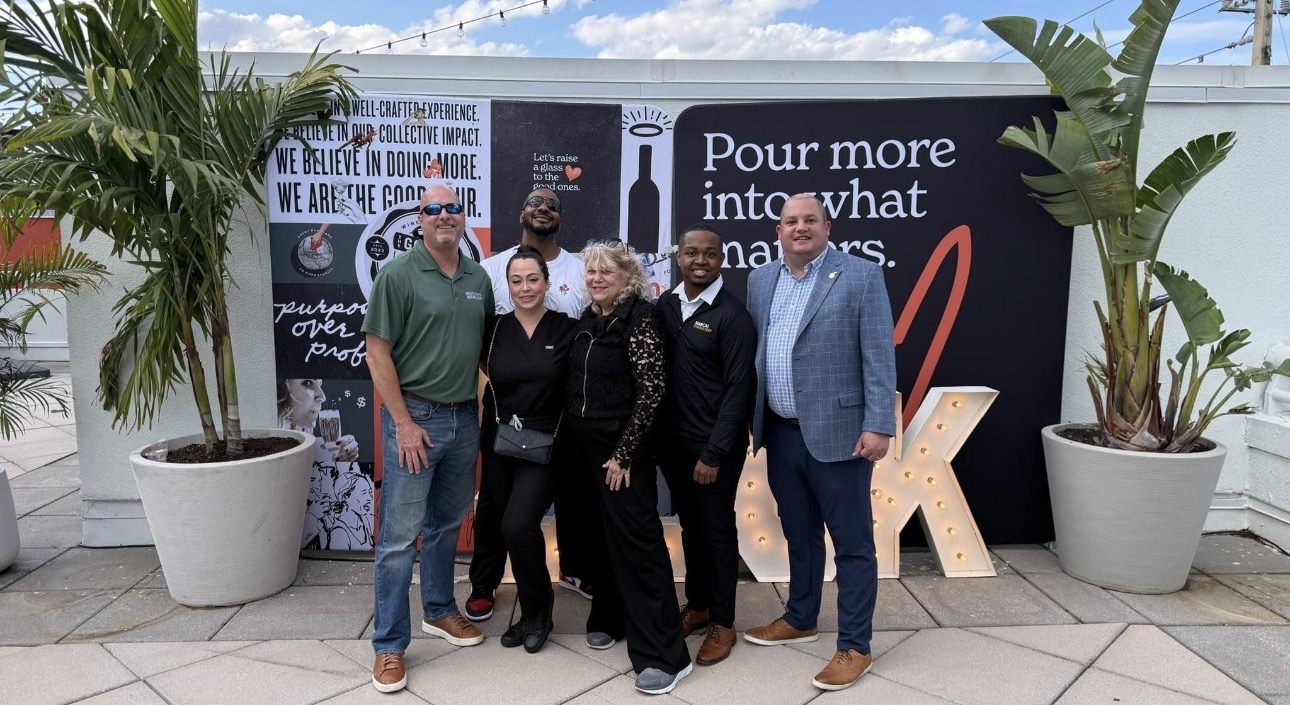 Marcai team and partners at a purpose-over-profit community charity event.